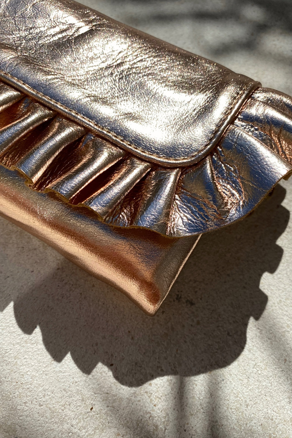 Hold me closer clutch - Rose Gold metallic